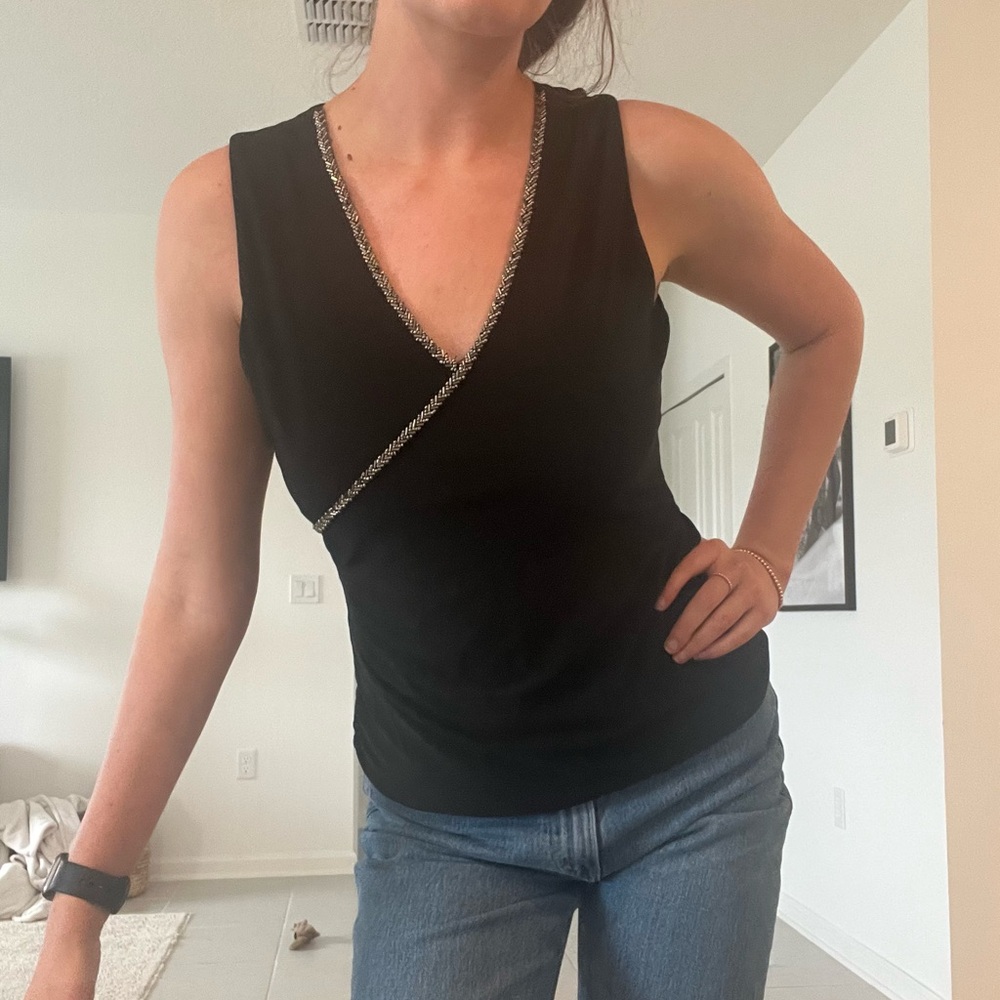 White House black market black V-Neck Sleeveless Top with beaded detailing.